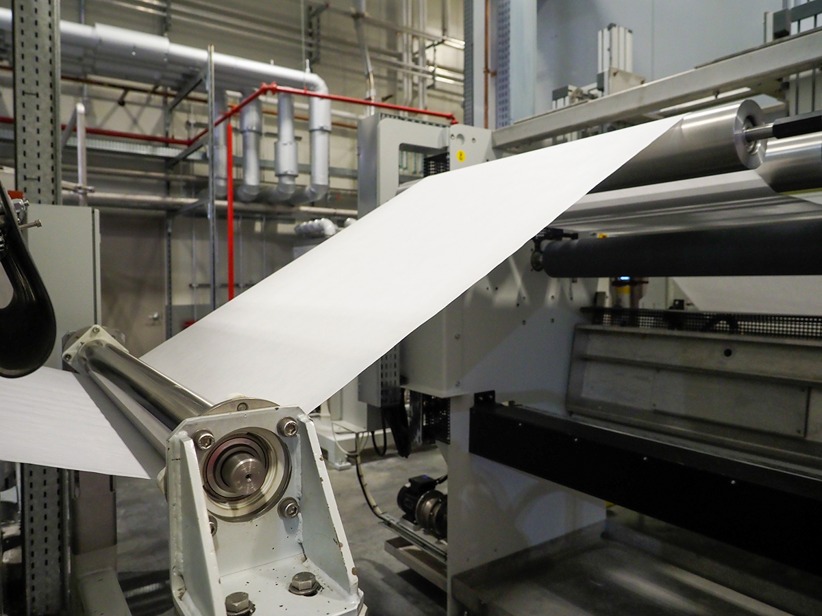 Meltblown nonwoven fabric being produced in NWI's Meltblown Pilot Lab.