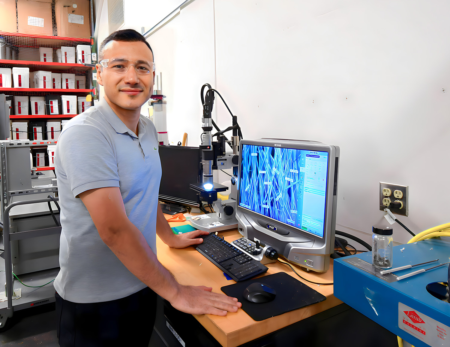 Mehmet Dasdemir, Ph.D., NWI's director of product development, evaluates nonwoven materials using the high-powered Keyence digital microscope in NWI's Fiber and Polymer Science Lab.
