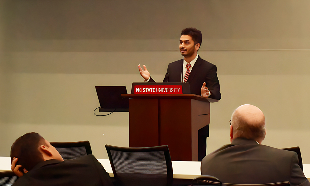 Nishant Bhatta presents during NWI's Industrial Advisory Board meeting.