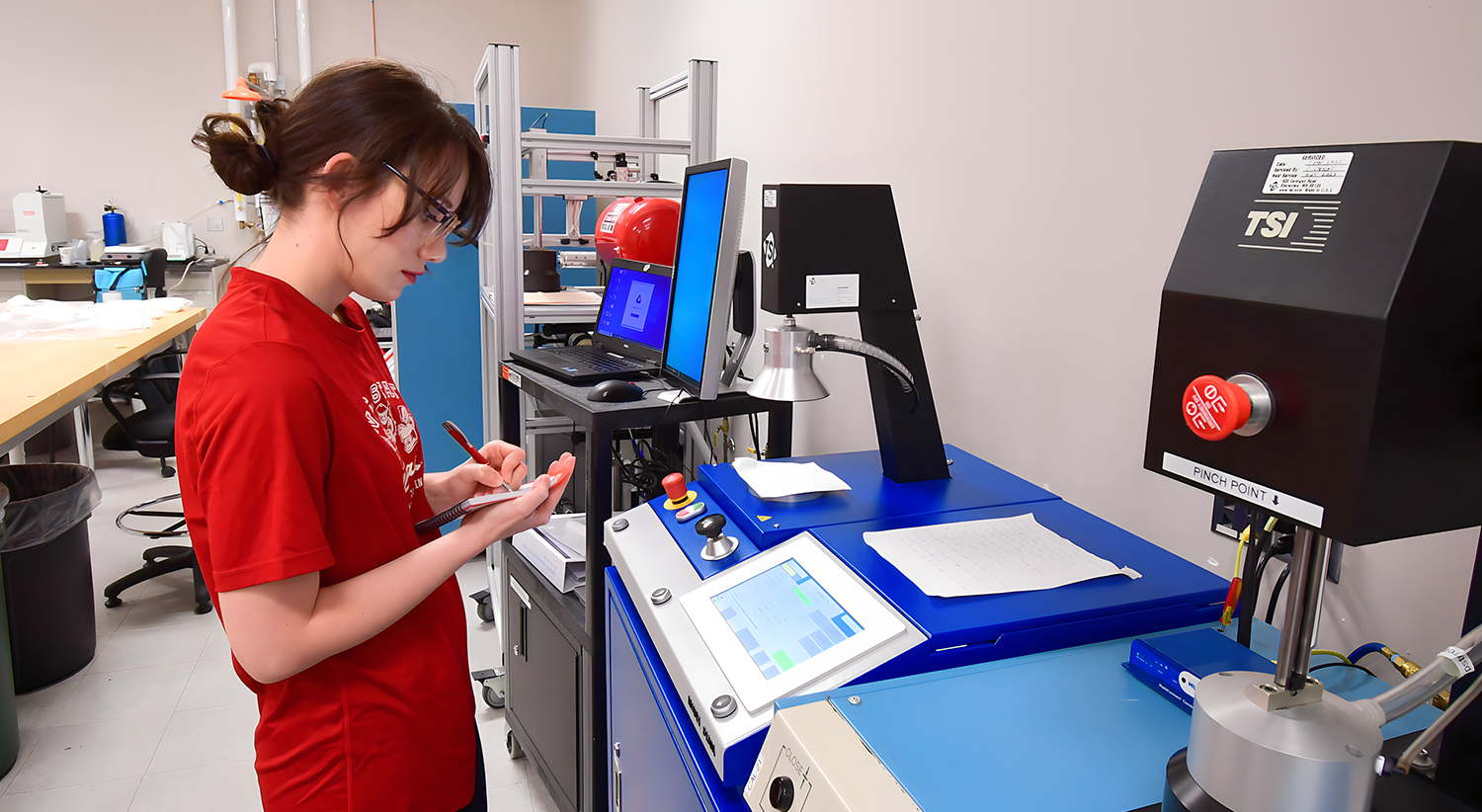 Researcher Performing Test In NWI's Filtration Testing Lab